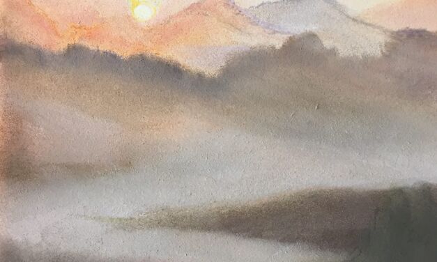 Lever de soleil brumeux sur les Pyrénées